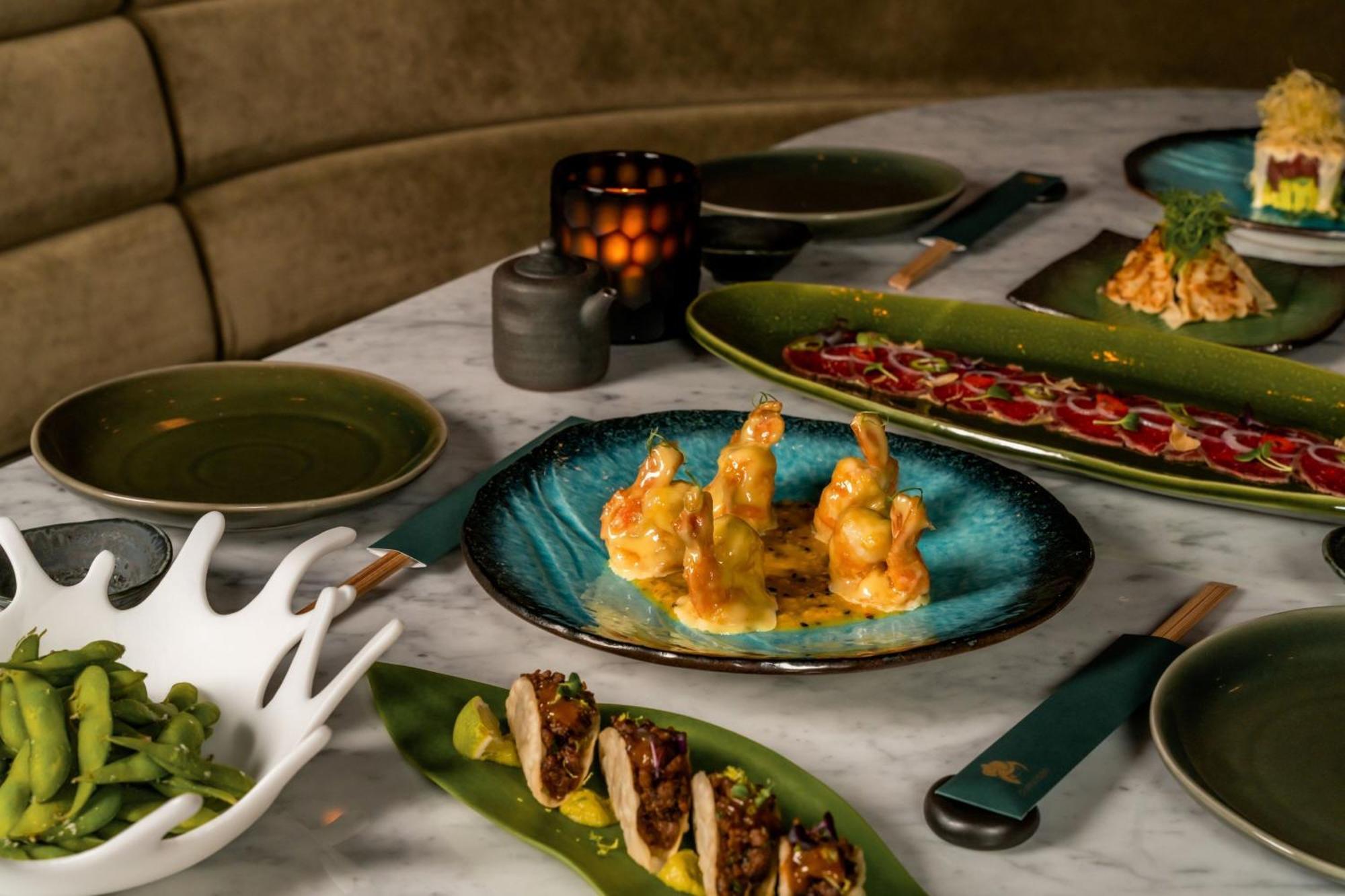 The Dubai Edition 외부 사진 A selection of dishes at the restaurant