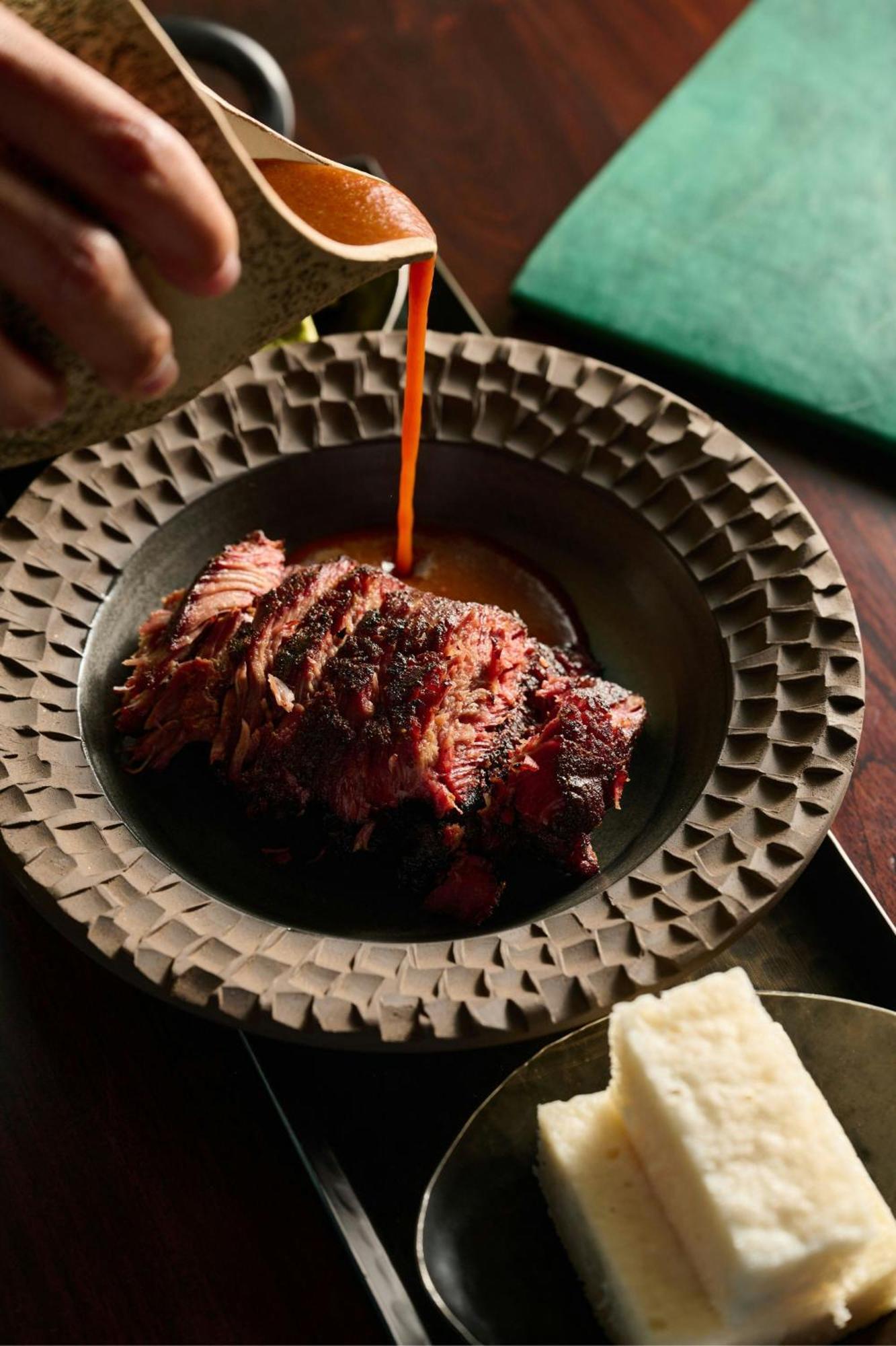 The Dubai Edition 외부 사진 A plate of grilled meat